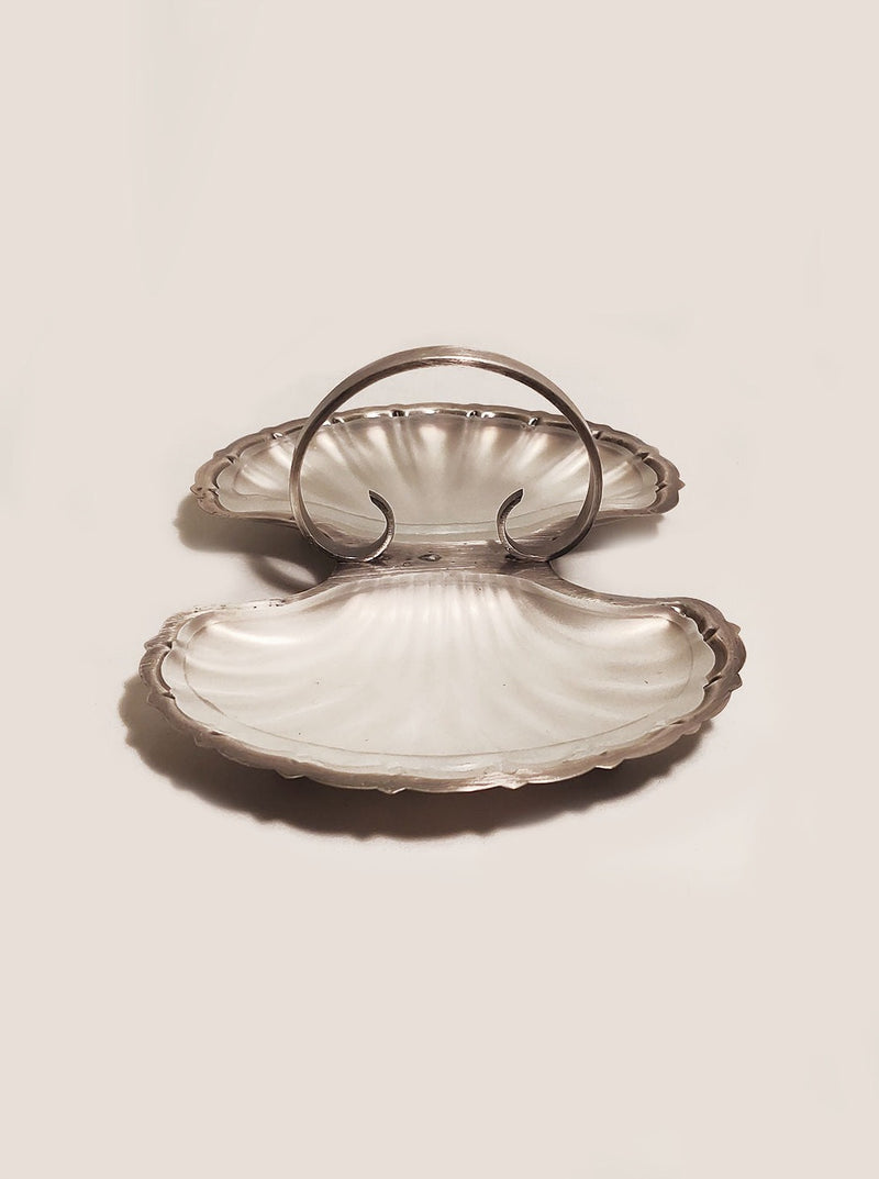 Double shell-shaped serving tray with gold accents and intricate design