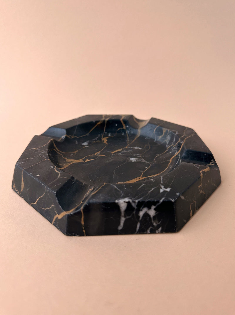 Elegant black marble ashtray from the 1970s featuring a unique octagonal design
