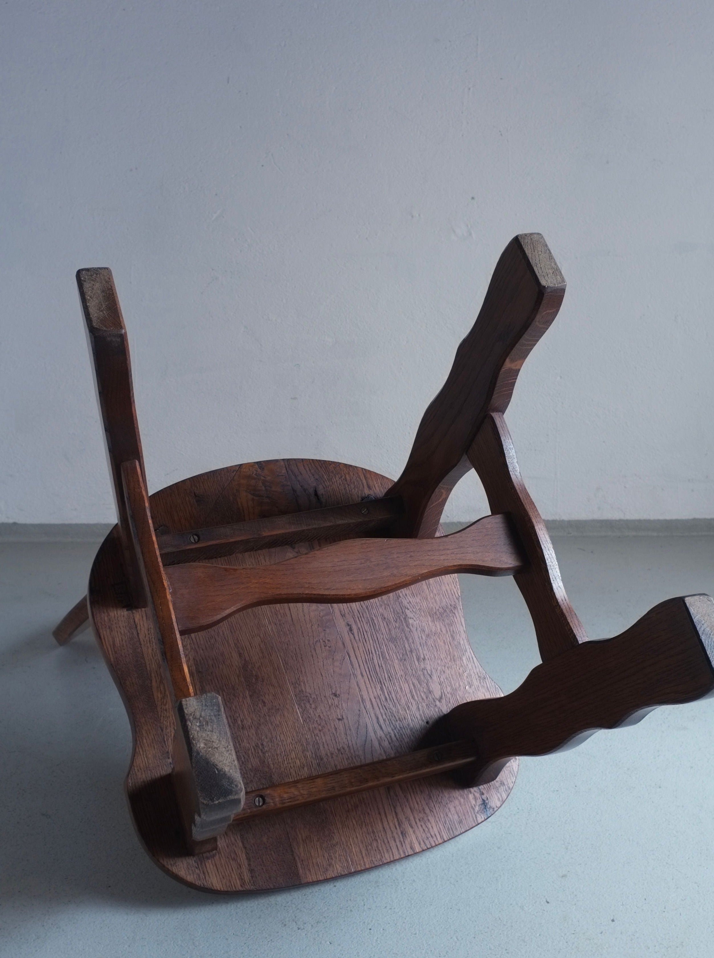 Pair of vintage Brutalist style carved oak dining chairs from the 1970s