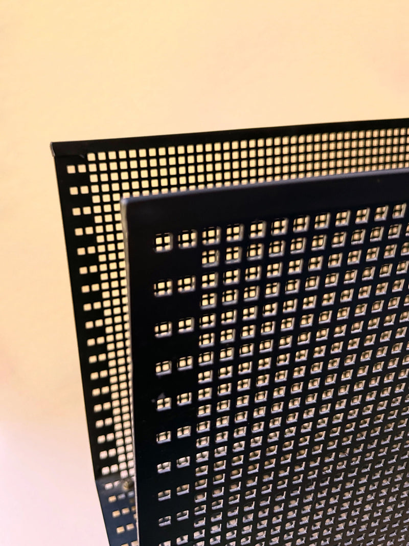 Vintage postmodern black magazine holder made of perforated metal
