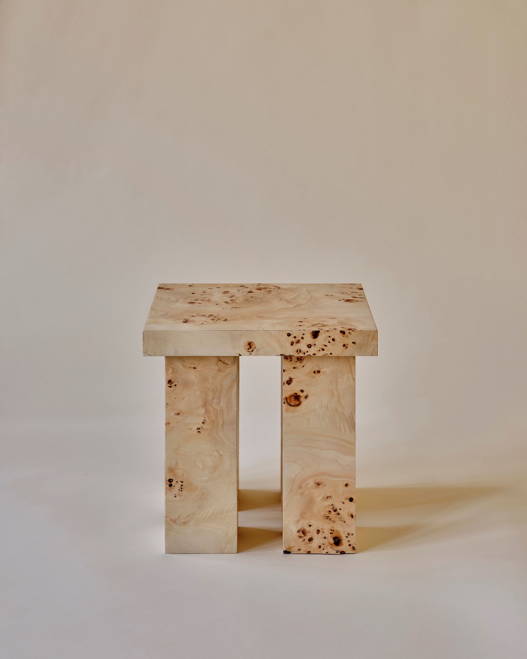 Modern wooden miter side table with clean lines and geometric design