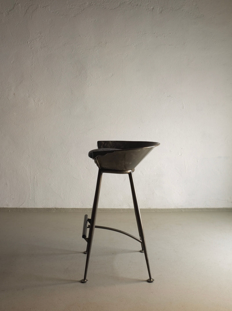 Pair of vintage 1980s Brutalist cast metal bar stools with industrial design