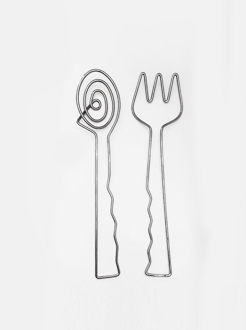 Two-piece modern salad serving set featuring sleek, ergonomic design ideal for tossing and serving fresh, colorful salads