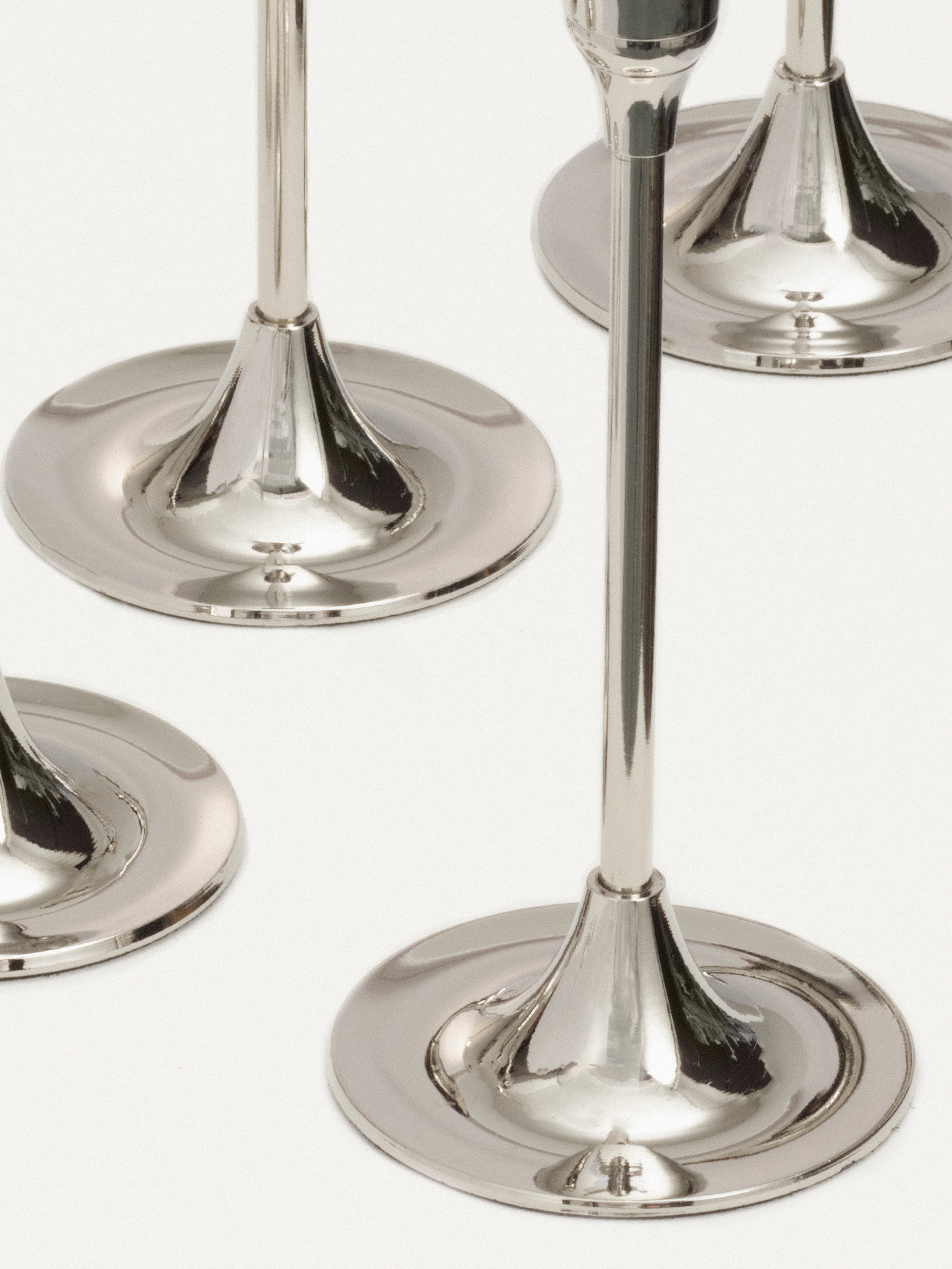  Silver candlestick set perfect for adding a touch of sophistication to any space