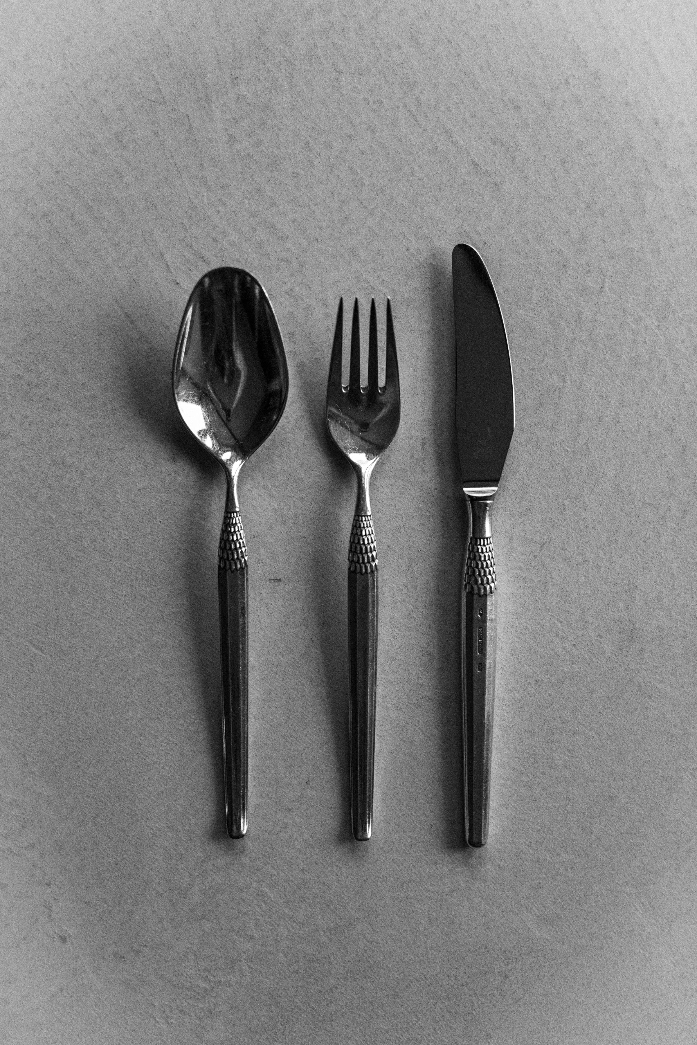 Art Deco Cutlery set displayed in a formal dining arrangement with classic charm