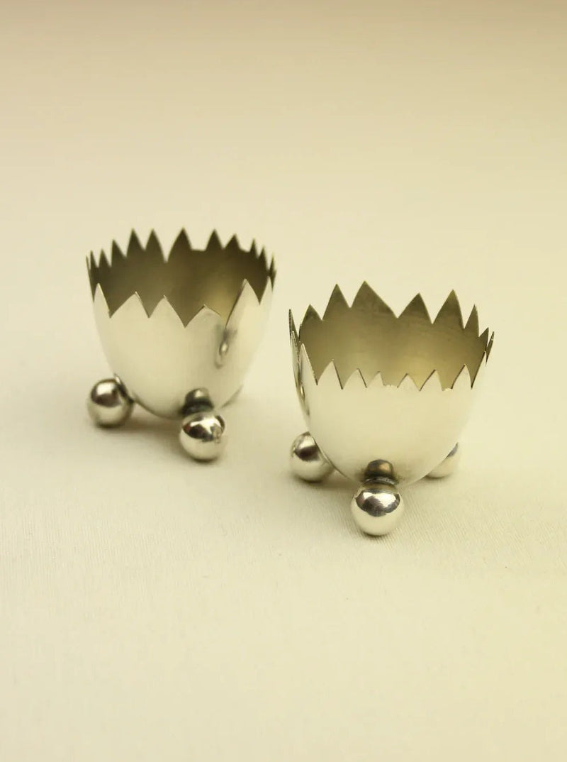 A pair of elegant silver plated egg cups, perfect for serving breakfast