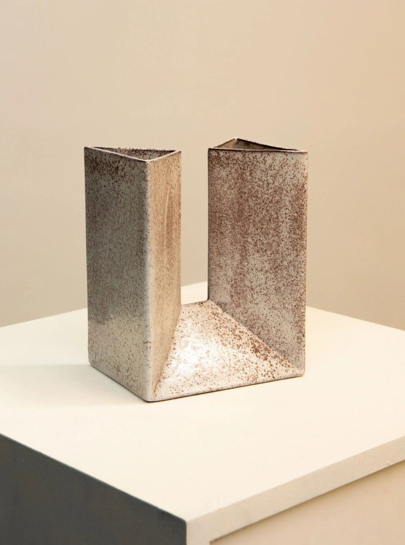 Two Italian Ceramic Vases by Alessio Tasca 70's with a textured finish stand on a white surface against a neutral background.