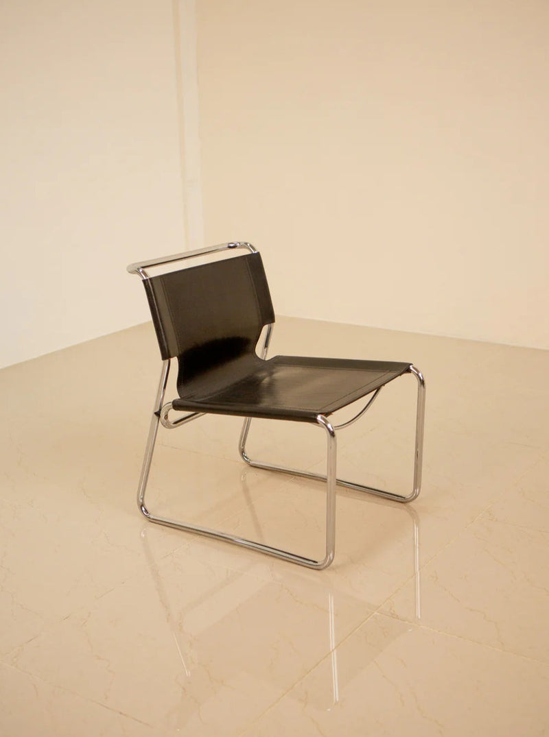 Vintage 1970's Marcel Breuer armchair with luge-style base and sleek design