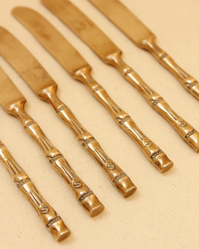Set of stainless steel butter knives with elegant curved design
