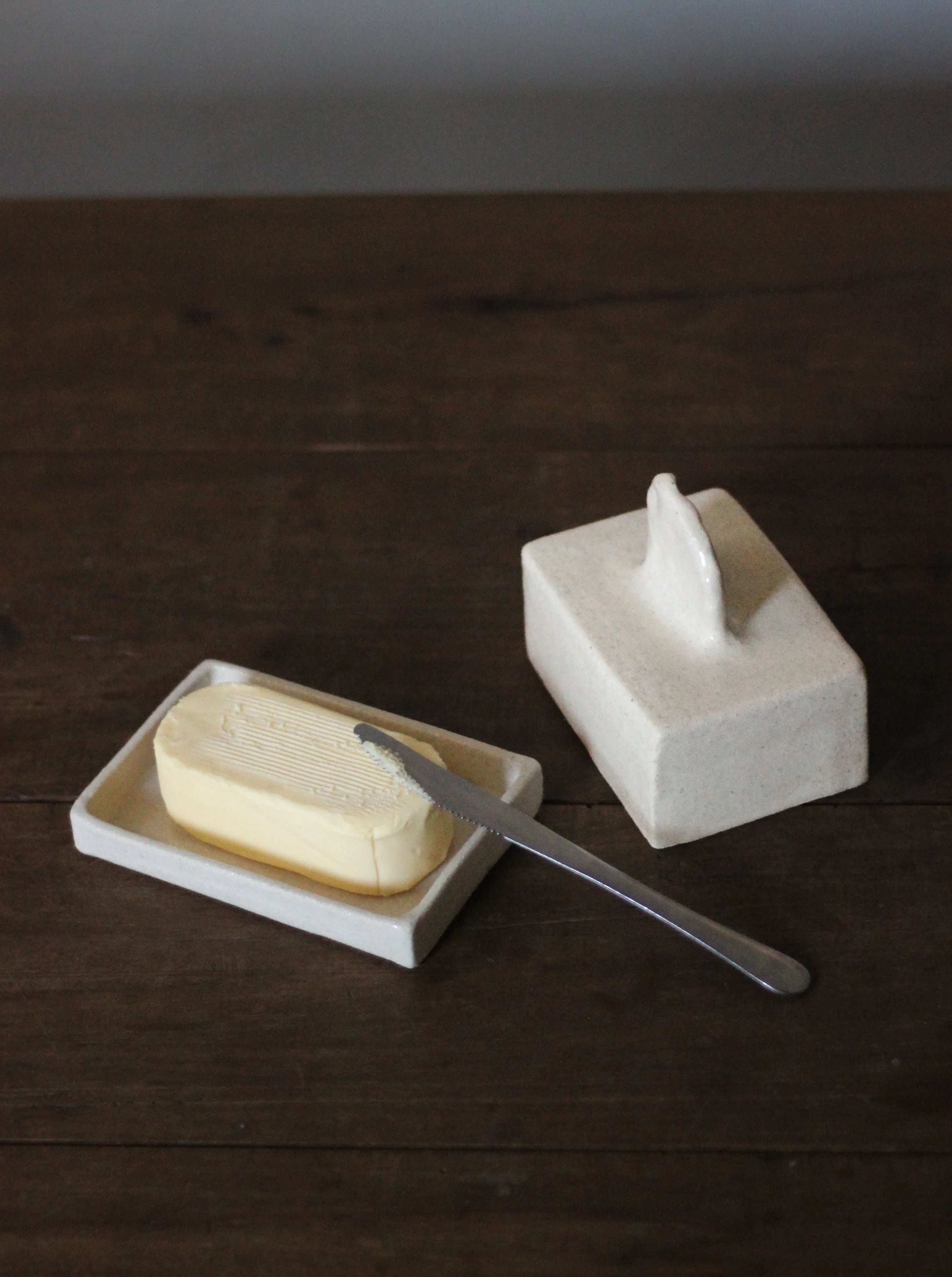 White ceramic Nabi Butter Dish with lid and handle for kitchen use