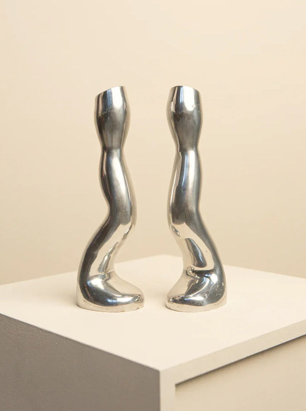 Pair of vintage 1980's cast aluminium candleholders with organic, biomorphic design