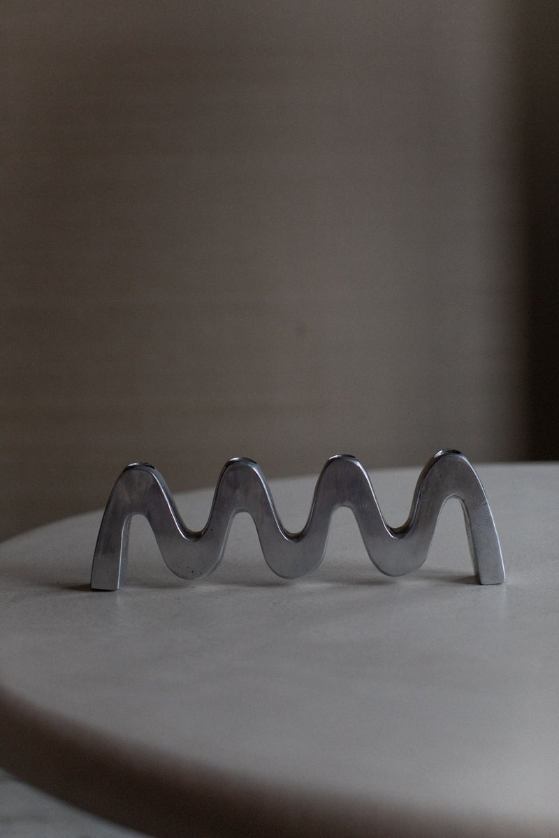  Modern Steel Candleholder with Elegant Curves and Stylish Look