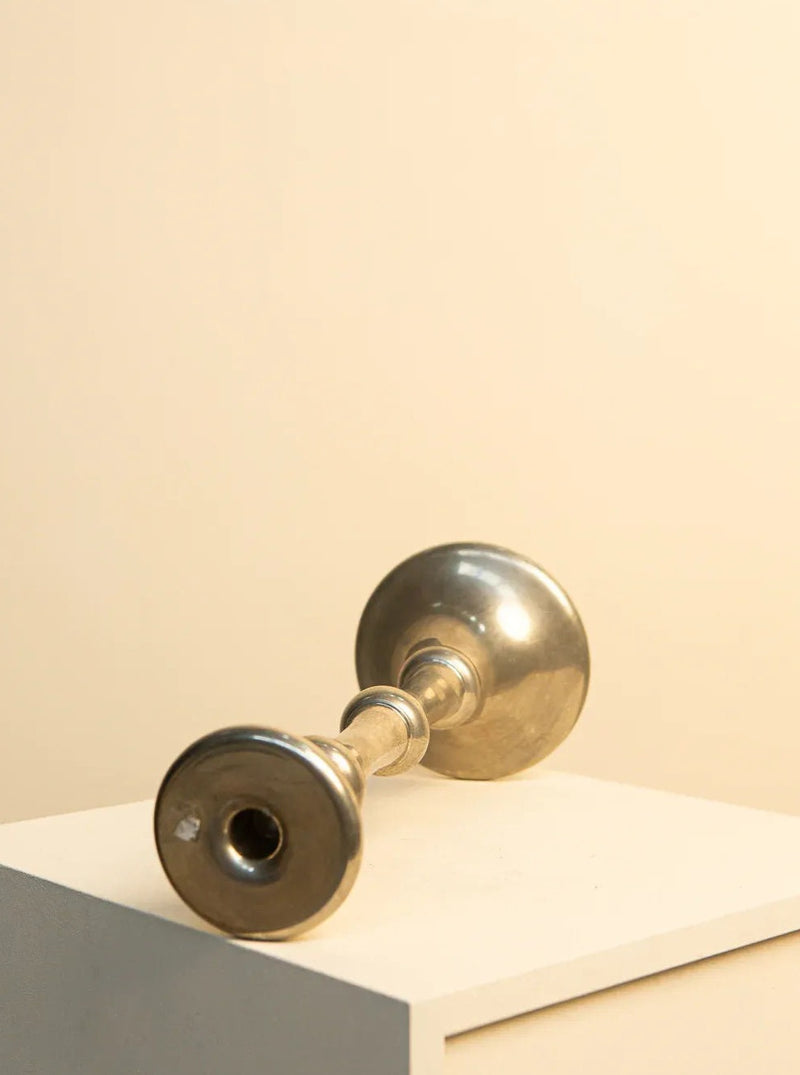 Handcrafted pewter candlestick with intricate detailing by renowned artist Giovanni Patrini