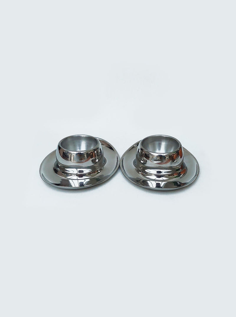 White ceramic egg cups with stylish and modern design, perfect for breakfast table