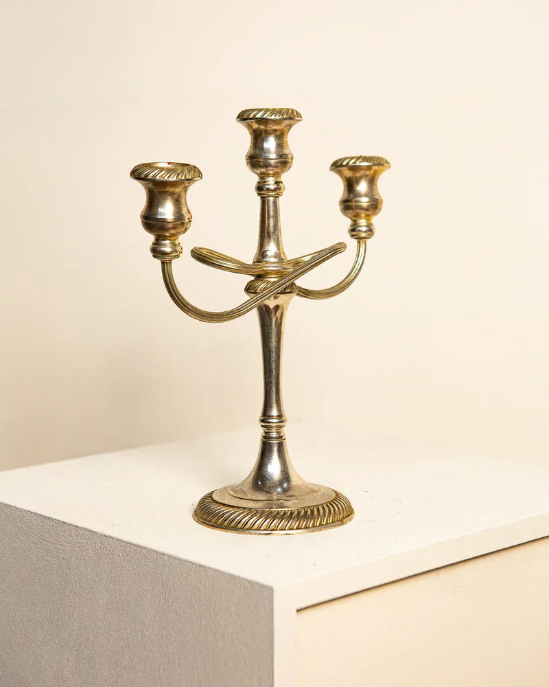 Pair of stylish Knot Candlestick 60's made of brass with a sleek and timeless design
