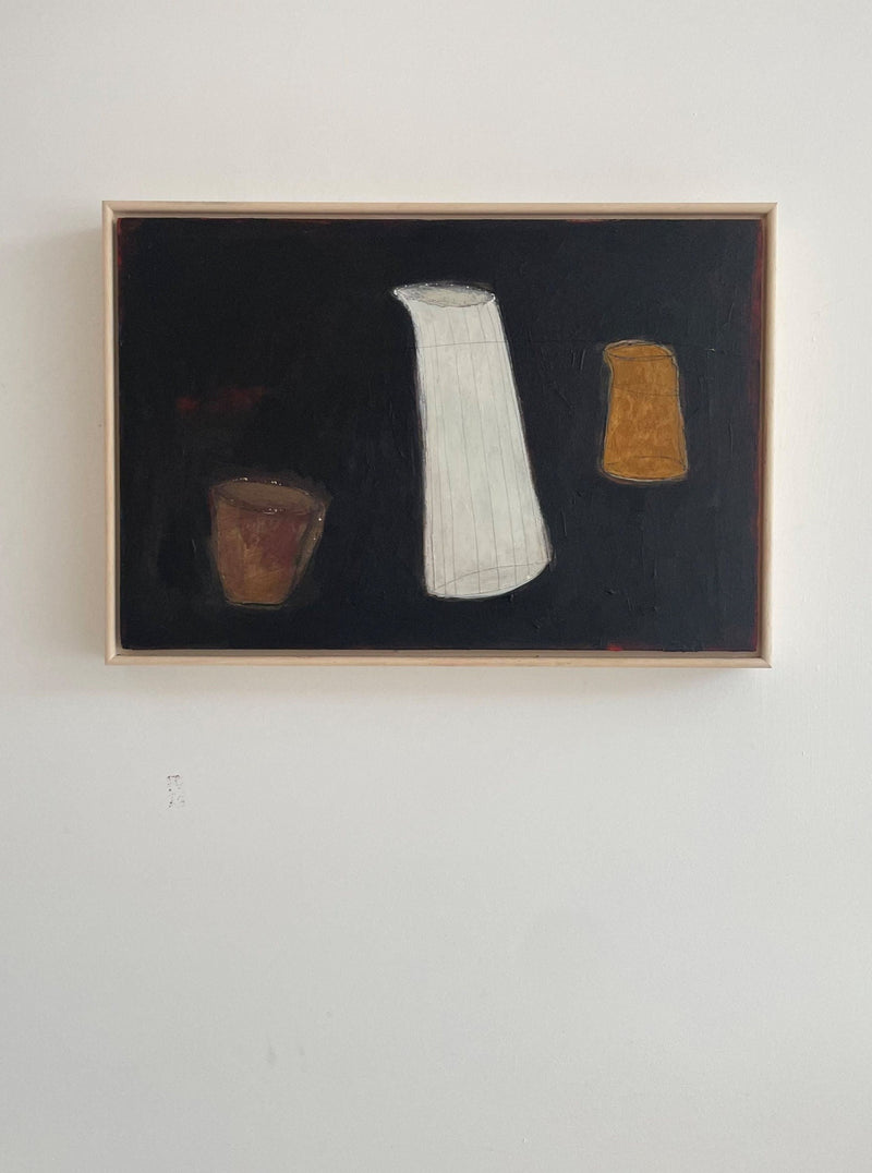 A painting featuring three abstract White Jug vase-like shapes in white, brown, and orange against a dark background, displayed in a light-colored frame on a white wall. This original painting is mounted on a crad.