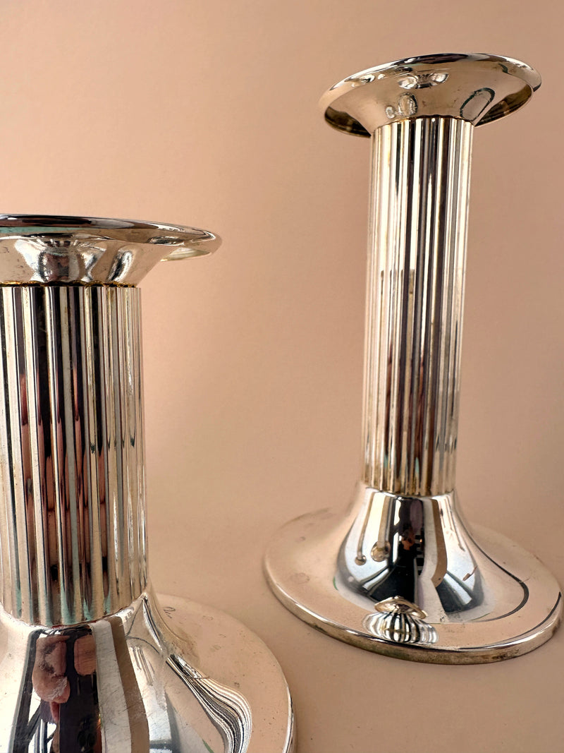 Three elegant silver plated candle holders in classicist style from the 1980s