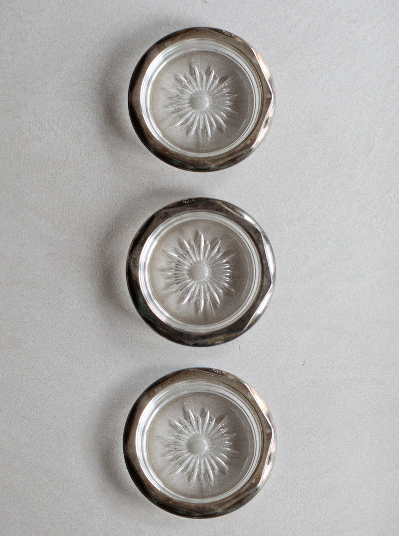 Glass coasters with elegant floral design and gold accents 