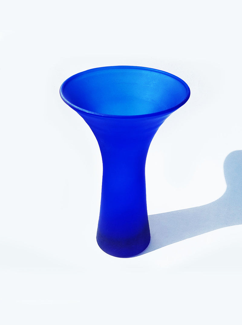 Beautiful handcrafted glass deep blue vase with intricate swirling patterns