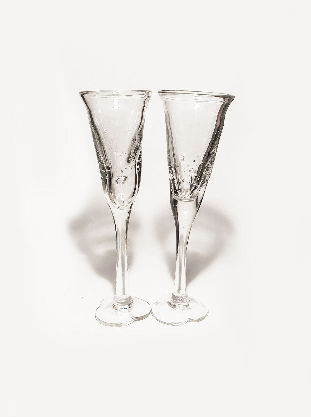 Duo of elegant, handcrafted bubble glass champagne flutes for celebrations and special occasions 