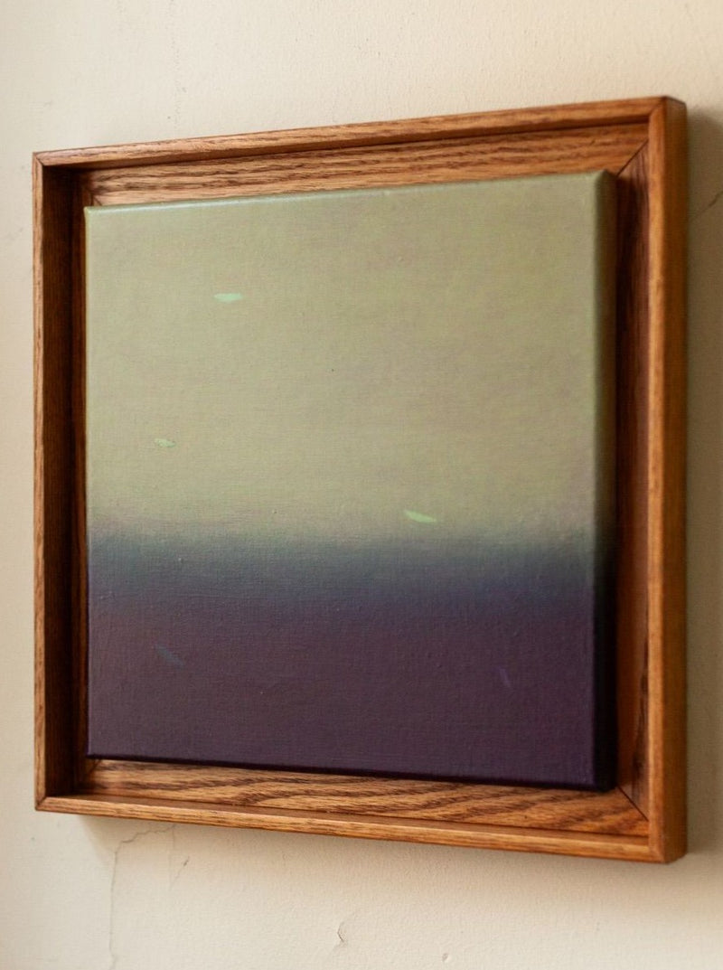 A framed painting of Love Letters #3, 2024 by Rebecca von Matérn with a smooth gradient transition from teal at the top to deep purple at the bottom, hanging on a white wall in a shadow frame.