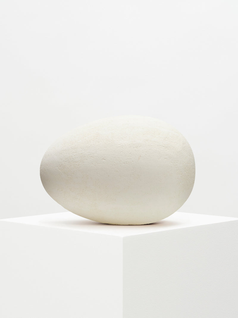 Beautifully handcrafted limestone egg sculpture with fine details