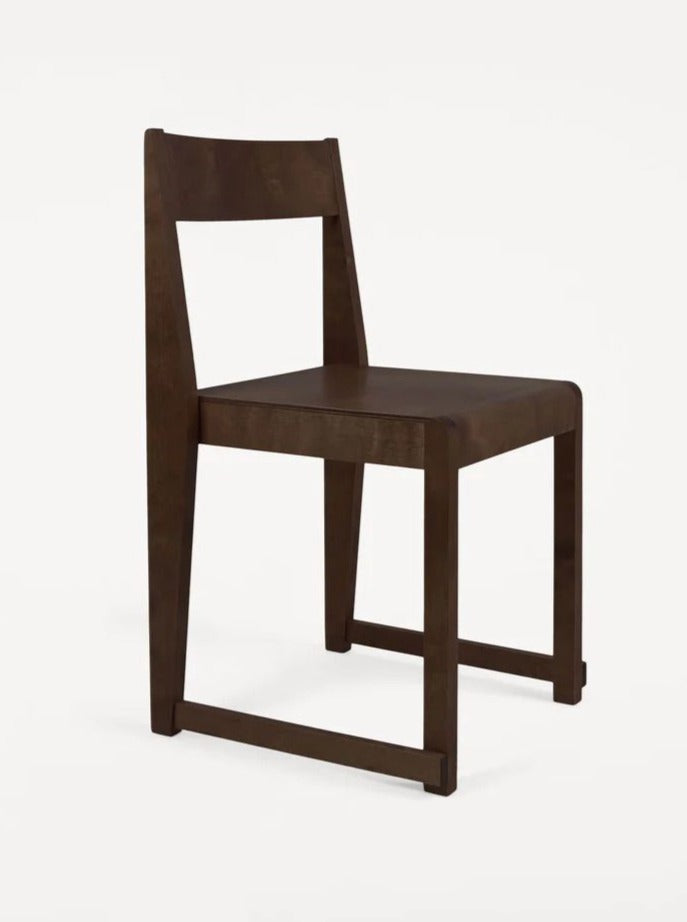 Dark birch chair with sleek, modern design and comfortable cushioning