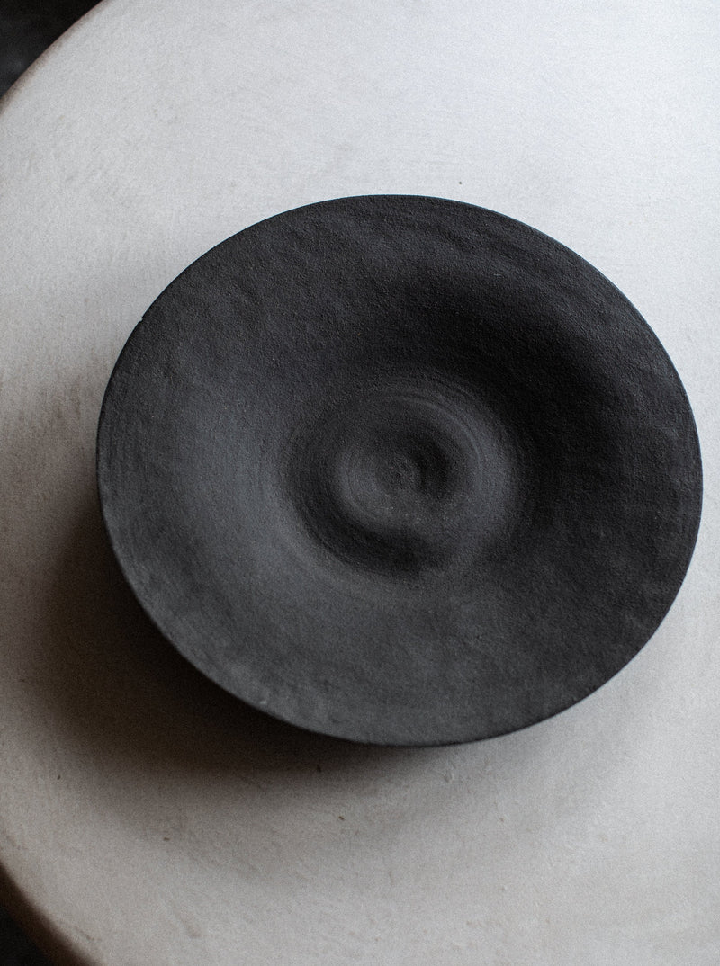 Decorative bowl with a unique sculptural design made from hand-blown glass
