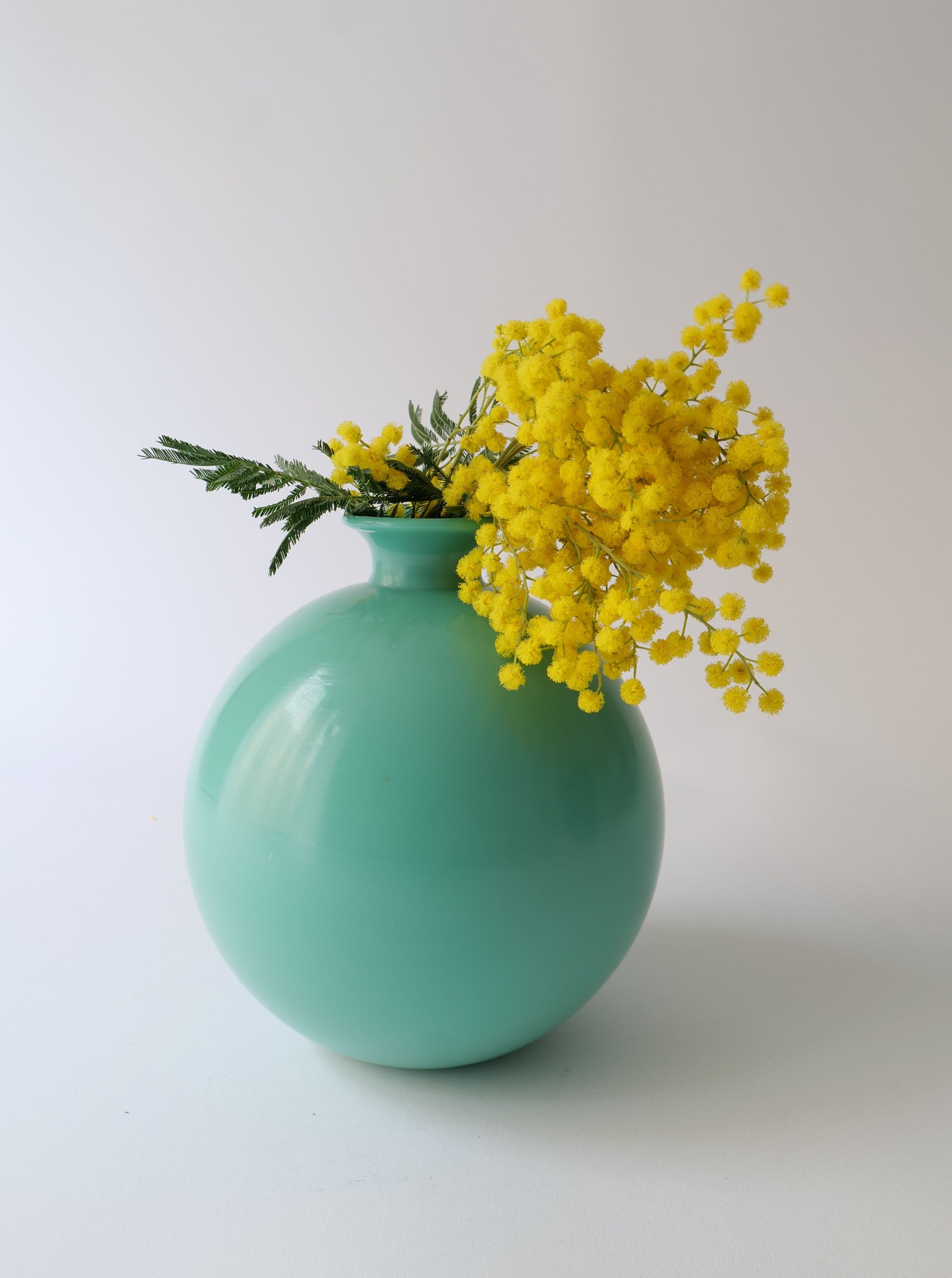 Vintage Flowerball Vase designed by Harald Notini in 1930, showcasing a spherical shape with delicate floral patterns, perfect for displaying fresh blooms in a timeless and elegant manner